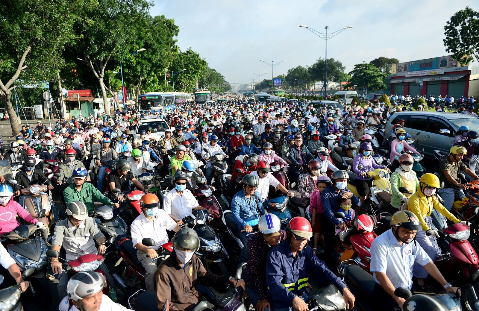 Crowded street full of motorcycles and scooters in Vietnam